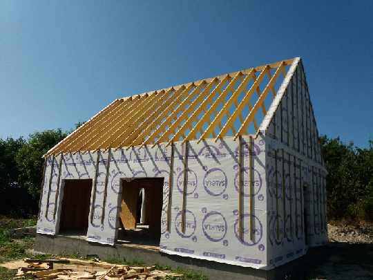 maison ossature bois avec charpente